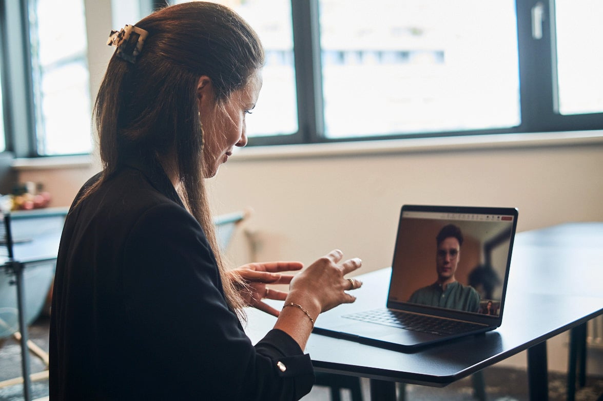 Counselor conducting a confidential video consultation with an employee.